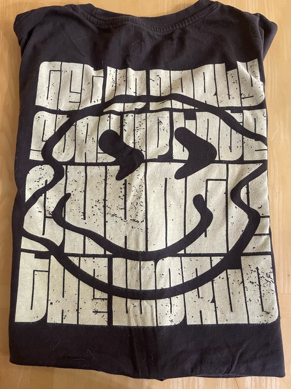 Dutch Bros Black Tee with Cream Smiley Graphic